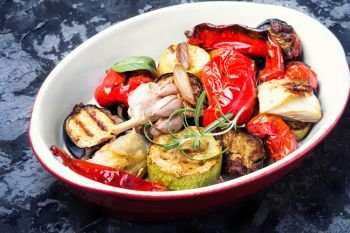 plate with grilled vegetables. grilled vegetables on a fashionable metal plate