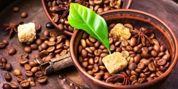 coffee roasted bean. Roasted coffee beans and spices in bowl.Coffee background