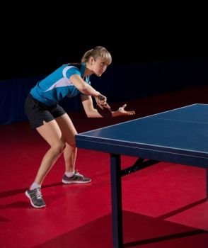Young woman table tennis player isolated