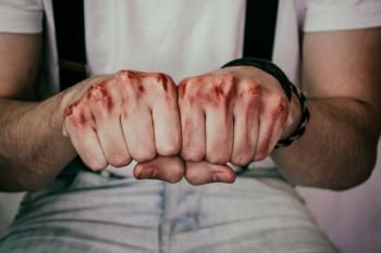 man fists with blood 