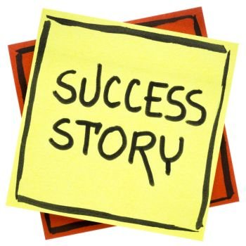success story  - handwriting in black ink on an isolated sticky note