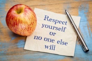 Respect yourself or no one else will - handwriting on a napkin with a fresh apple