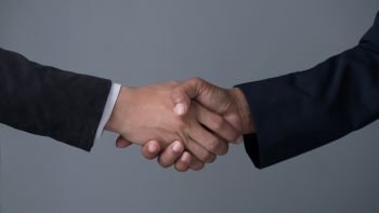 handshake of business partners. Image businessman handshake , Hand holding on gray background