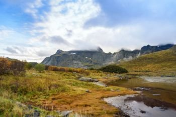 Beautiful mountain range landscape with cloudy sky, Lofoten, Norway