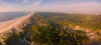 Aerial view of secondary sand dunes at sunset in Murtosa, Aveiro - Portugal. North view.