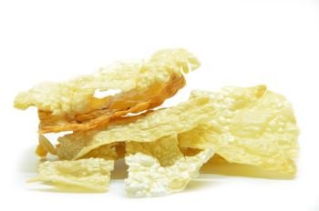 Dried bean curd skin isolated on white background