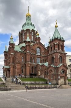 Uspenski Cathedral in the city of Helsinki in Finland. The Cathedral is on a hillside on the Katajanokka peninsula overlooking Helsinki. Designed by the Russian architect Aleksey Gornostayev (1808a€“1862), it was completed in 1868 after his death.