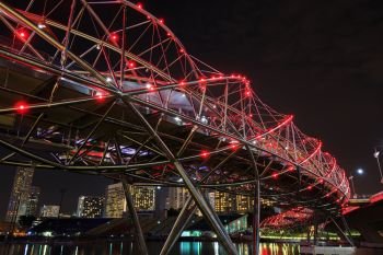 The Helix Bridge in Singapore city at night