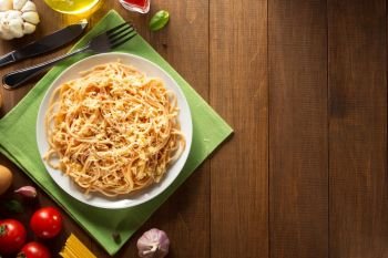 ready pasta  on wooden background