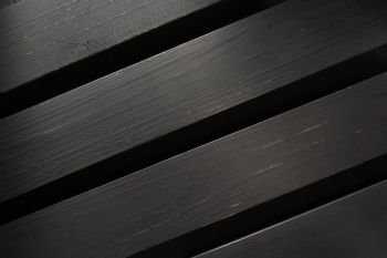 wooden board at black background