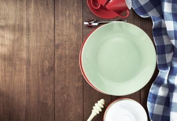 dishes set on wooden background