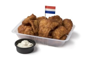 Plastic bowl with traditional Dutch kibbeling, deep fried fish, and sauce on white background