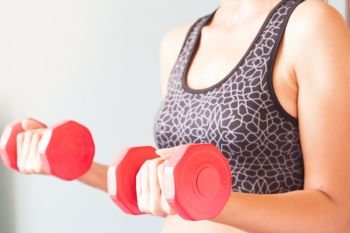 Fitness woman holding red dumbbells, Workout and healthy
