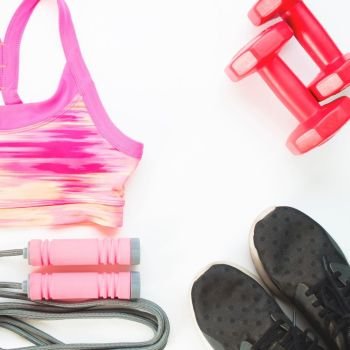 Flat lay of woman sport equipments, Working out and healthy concept