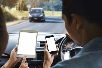 couple using phone inside car on rural road mobile app concept