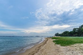View of the sea from East Coast Park in Singapore under the beautiful blue sky with cloudy