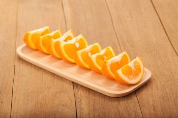 orange fruit on wood background