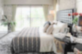 defocus blur abstract background of modern bedroom interior