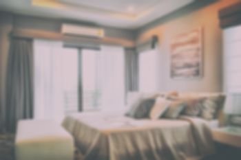 Blur image of modern luxury bedroom interior