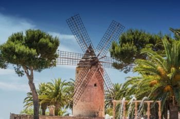 Old historic windmill on a farm of Majorca (Spain)