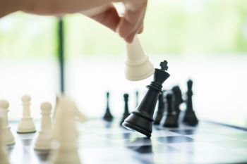 Business Strategic Formation in the chess game king is checkmated game over.
