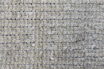 Dark green knitting fabric texture background or knitted pattern background. Knitting or knitted background
