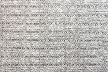 Horizontal gray knitting fabric texture background or knitted pattern background. Knitting or knitted background for design.