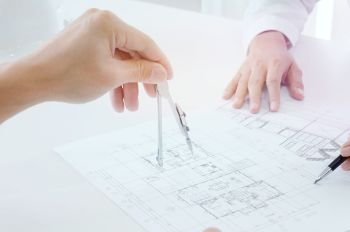 Colleagues interior designer Corporate Achievement Planning Design on blueprint Teamwork Concept with compasses