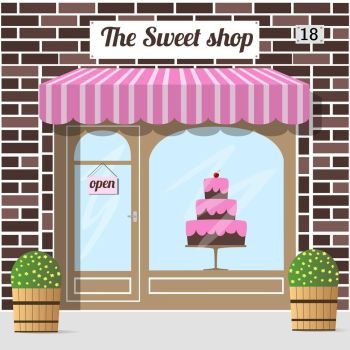 Sweet shop. Candy store, confectionery store. . Sweet shop s building facade of red brick. A big cake in the shop window. EPS 10 vector.