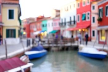 Old European city Burano blur background. Out of focus city view