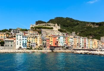 Beautiful medieval fisherman town of Portovenere (UNESCO Heritage Site) view from sea (near Cinque Terre, Liguria, Italy).