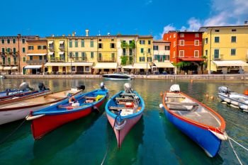 Lazise colorful harbor and boats view, Lago di Garda, Veneto region of Italy