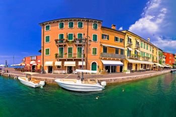 Lazise colorful harbor and boats panoramic view, Lago di Garda, Veneto region of Italy