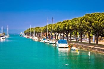 Lago di garda turquoise harbor in Peschiera view, Veneto region of Italy