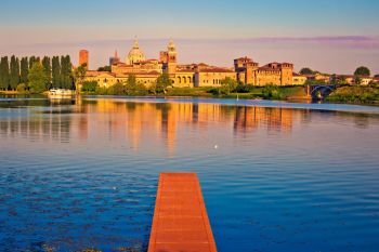City of Mantova skyline early morning view from lago Inferiore, European capital of culture and UNESCO world heritage site, Lombardy region of Italy