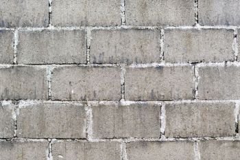 Old wall made from cinder blocks as background texture