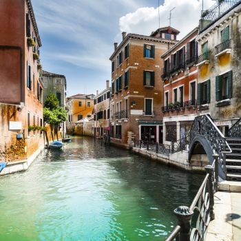 Venice is situated across a group of islands that are separated by canals and linked by bridges. Gondola is a traditional, flat-bottomed Venetian rowing boat