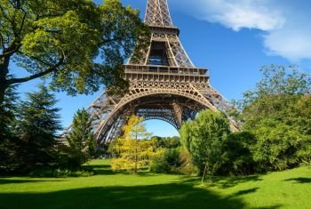 Eiffel Tower and trees in park of Paris, France