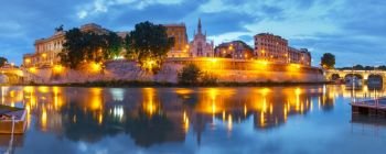 Church of the Sacred Heart in Prati, Rome, Italy. Panoramic view of Tiber riverside with Church of the Sacred Heart of Jesus in Prati and mirror reflection during evening blue hour in Rome, Italy