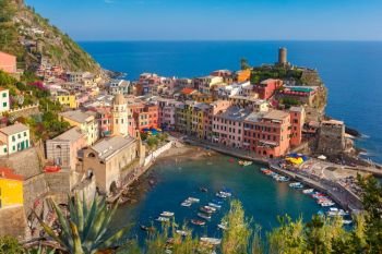 Panorama of Vernazza, Cinque Terre, Liguria, Italy. Aerial panoramic view of Vernazza fishing village in the evening, Five lands, Cinque Terre National Park, Liguria, Italy.