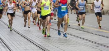 Marathon running race on the city road
