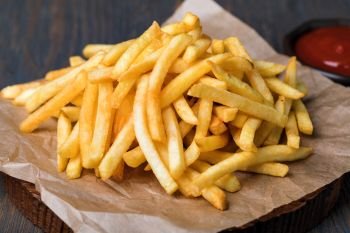french fries. Tasty french fries on cutting board