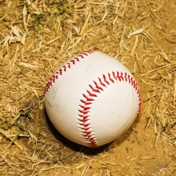 Baseball in the dirt, dry field, square image