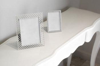 modern picture frame on white table decoration in living room