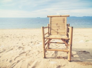 chairs on tropical beach (Vintage filter effect used)