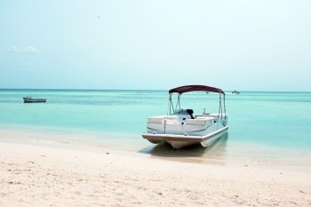 Boats on the beach at Palm Beach on Aruba island in the Caribbean