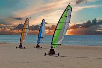 Sailing carts at the beach at sunset in the Netherlands