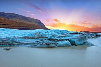 Jokulsarlon, glacier and lake at Iceland at sunset