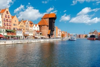 Facades of old medieval houses on the waterfront in Gdansk.. Gdansk. Central City Quay.