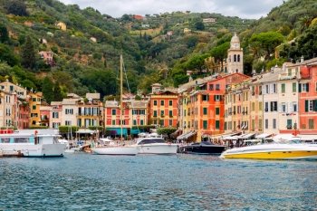 Portofino. The resort town in Liguria.. Pleasure boats and yachts in the harbor village of Portofino. Italy. Liguria. Cinque Terre.